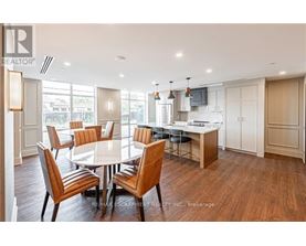 A dining room with a table set for six.