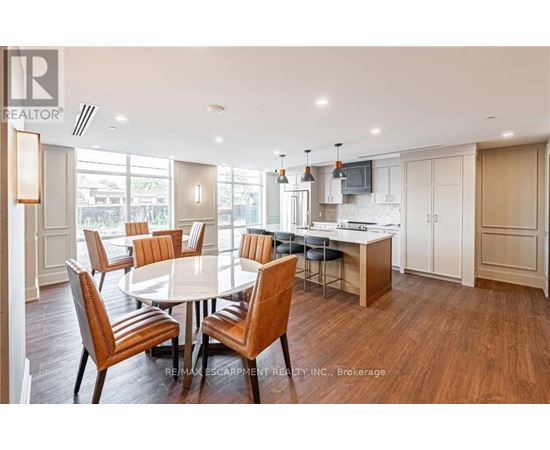 A dining room with a table set for six.