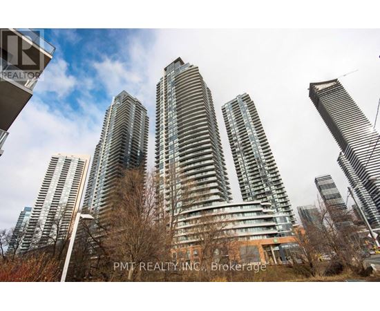 A group of tall buildings with the text "PMT REALTY INC, Brokerage" on the bottom right.