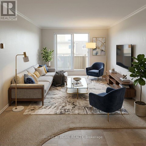 A living room with a grey sofa, a blue armchair, a white coffee table, and a large window.