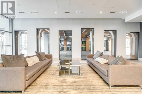 A modern living room with two couches and a coffee table.