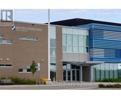 Maple Ridge Secondary School is a two-story building with a modern design.