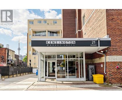 The front of a building with a sign that says Kensington Market Lofts.