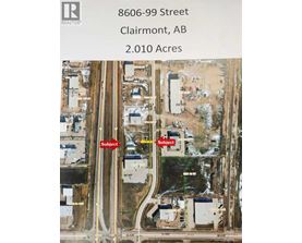 An aerial view of a property at 8606-99 Street, Clairmont, AB, covering 2.010 Acres.