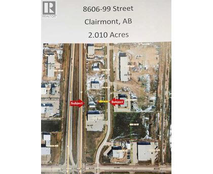 An aerial view of a property at 8606-99 Street, Clairmont, AB, covering 2.010 Acres.