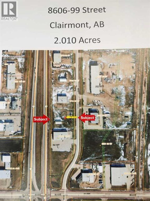 An aerial view of a property at 8606-99 Street, Clairmont, AB, covering 2.010 Acres.
