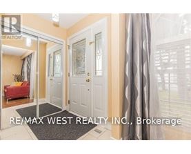 A brokerage office for RE/MAX West Realty Inc.