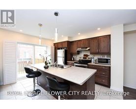 A kitchen with a counter and a microwave on it.