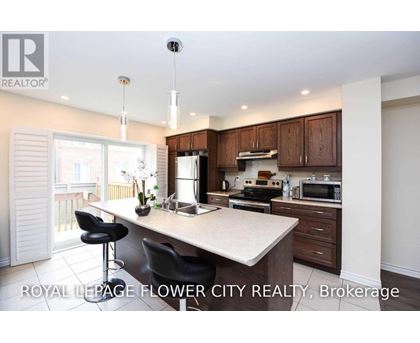 A kitchen with a counter and a microwave on it.