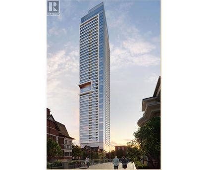 A tall, modern glass building is depicted in an architectural rendering.