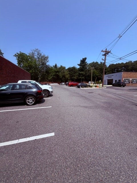 A parking lot with cars parked in it.