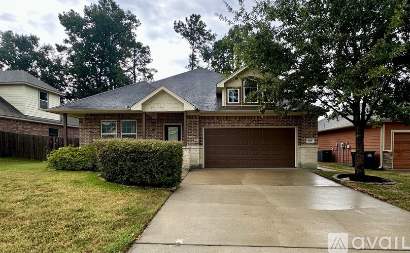 A house with a garage is available for sale.