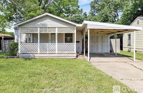 A small house with a porch and a covered entrance.