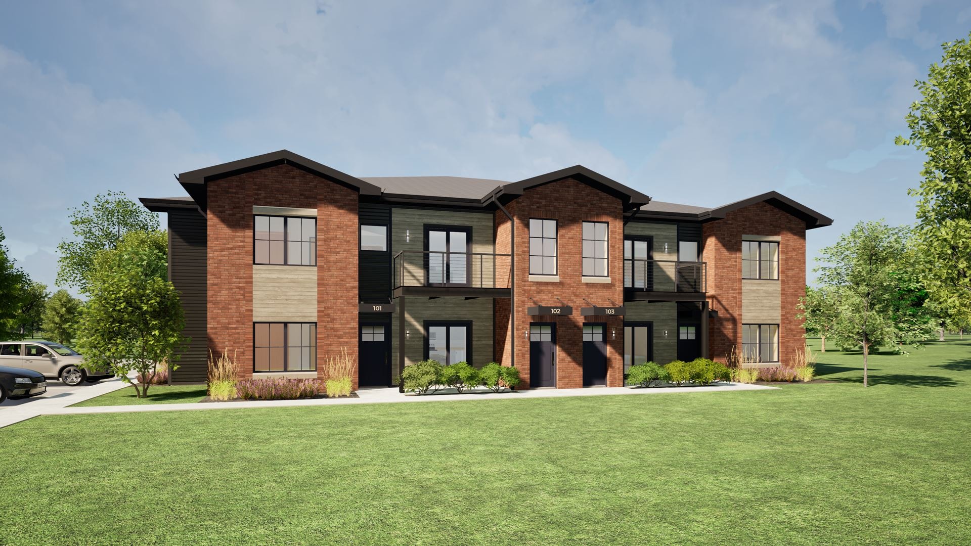 A modern brick house with a green lawn in front.