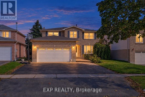A house with a driveway and garage is shown in the image.