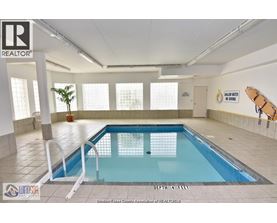A large indoor swimming pool with a depth of 4 feet.
