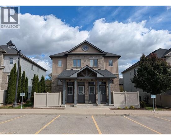 A building with a grey front and a sign that says REALTOR.