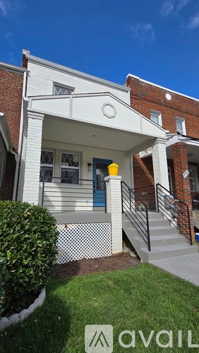 A house with a blue door and a sign that says "available".