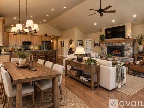 A kitchen with wooden cabinets and black countertops.