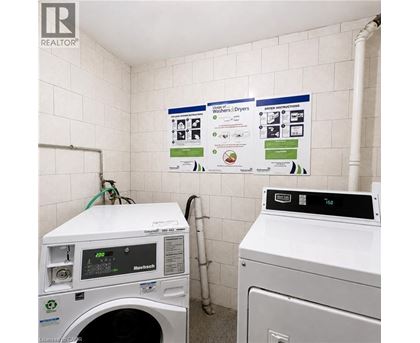 A washer and dryer in a small laundry room.