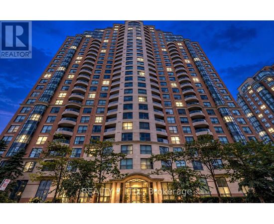 A tall building with the word REALTOR on the top left corner.