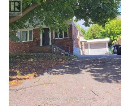 A house with a garage is for sale by Bay Street Group Inc.