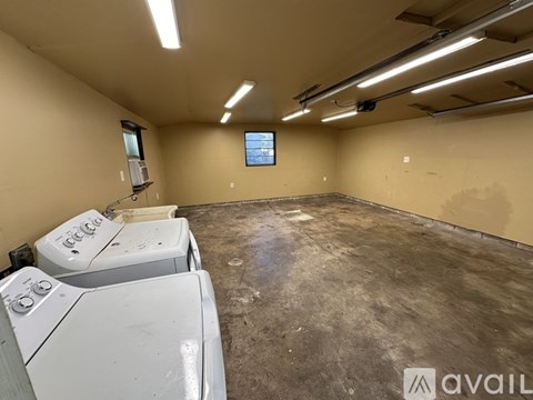 A laundry room with a washer and dryer.