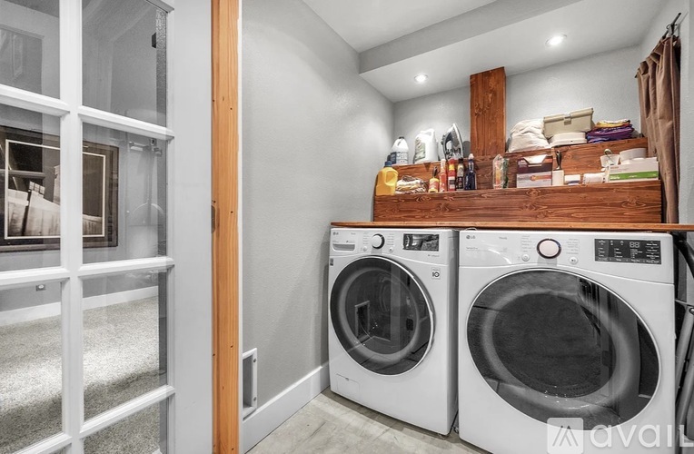A laundry room with a washer and dryer.