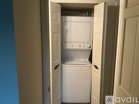 A white dishwasher is installed in a kitchen.