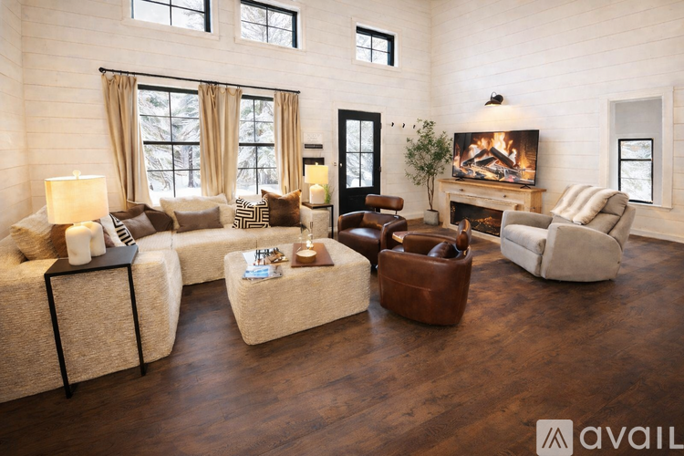 A living room with a fireplace and a couch.