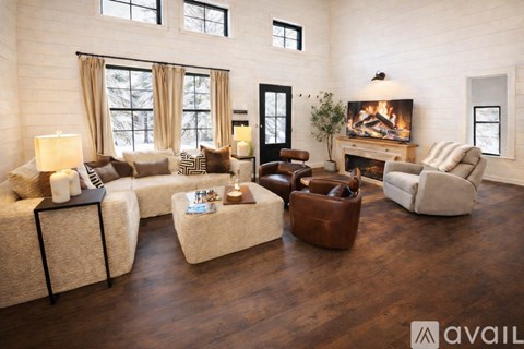 A living room with a fireplace and a couch.