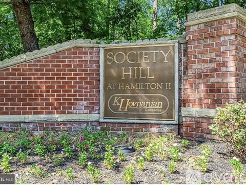 A sign that says Society Hill Hamilton II K Jovian companies.