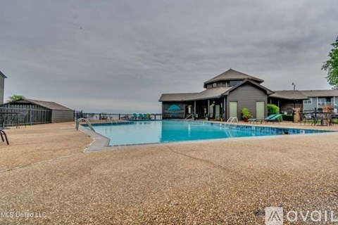 A house with a pool in the backyard.