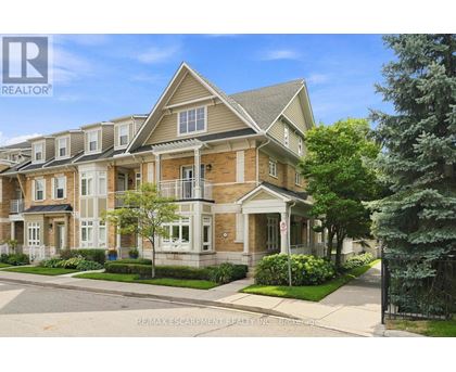 A large, well-maintained apartment complex with multiple buildings and greenery.