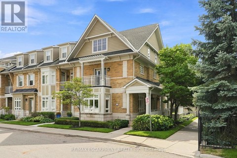 A large, well-maintained apartment complex with multiple buildings and greenery.
