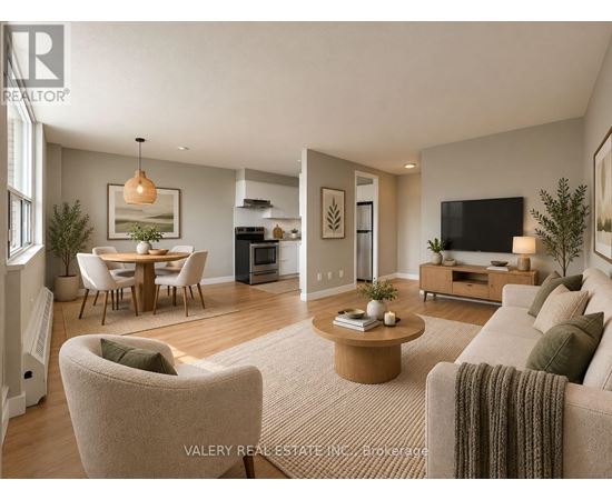 A living room with a couch, chairs, and a coffee table.