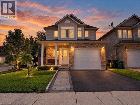A house with a garage is shown in the image.