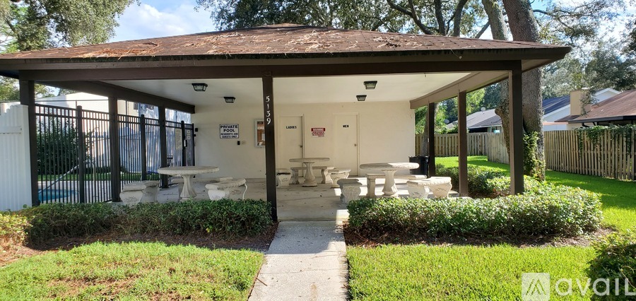 A gazebo with a table and chairs is available for rent.