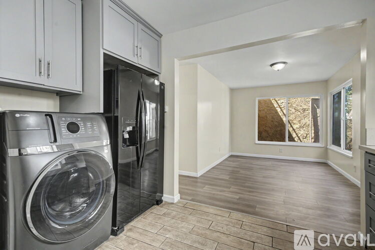 A laundry room with a washer and dryer.