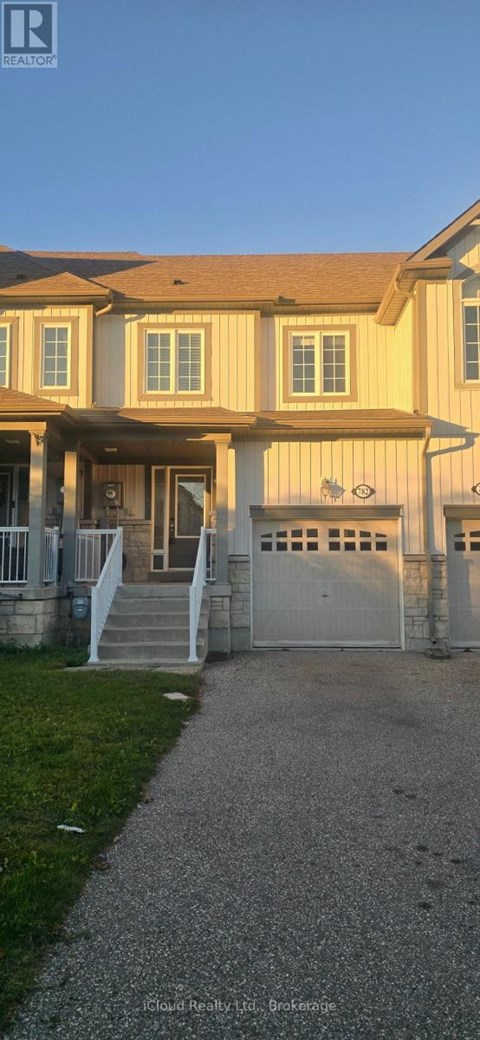 A house with a driveway in front of it.