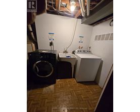 A laundry room with a washer and dryer.