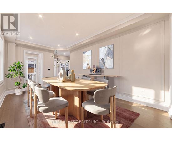 A dining room with a wooden table and chairs.