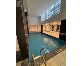 A swimming pool with the number 1050 on the floor.