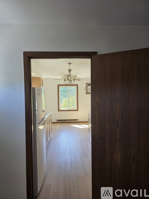 A wooden door with a number 2 on it.
