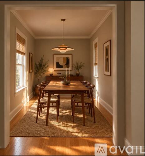 A dining room with a wooden table and chairs.
