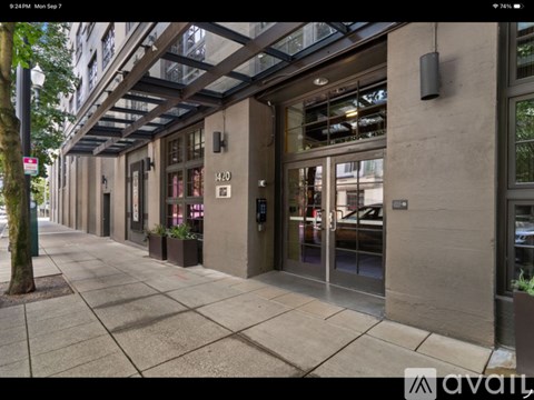A street view of a building with the number 420 on it.