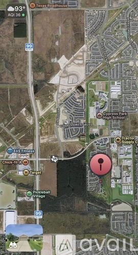 A map with a red circle and a keyhole icon in the middle of a field.
