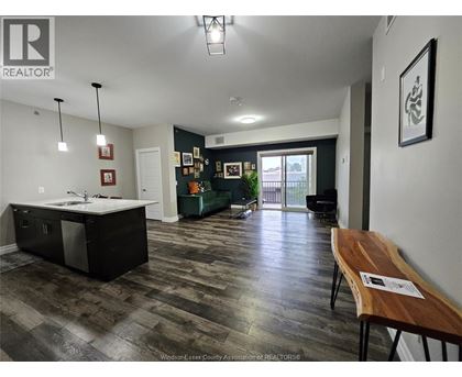A realtor logo is on the top left of the image.