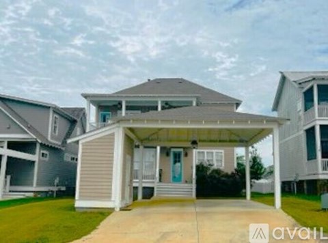 A house with a porch and a covered patio is for sale.