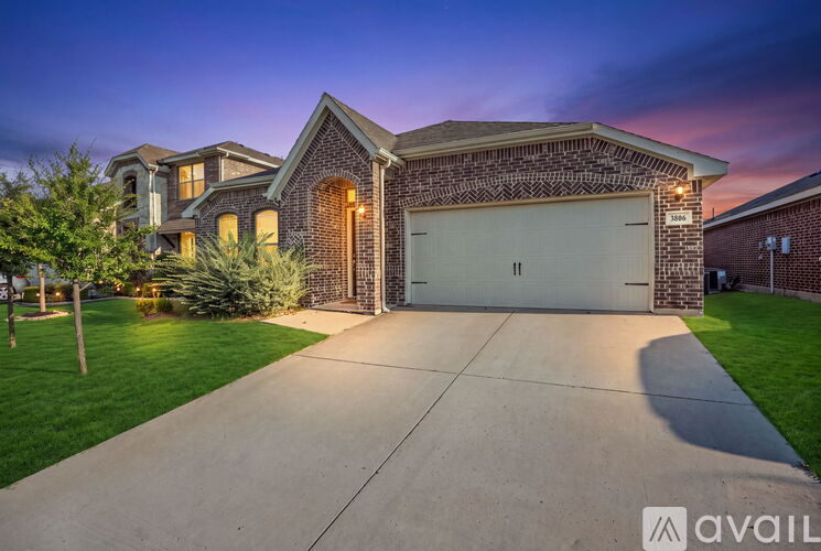 A house with a driveway in front of it.